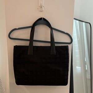 Chanel black tote bag. great condition. Have authentication card as well.